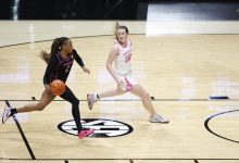 Vanderbilt guard Mikayla Blakes drives around Oklahoma guard Payton Verhulst during a 2025/26 NCAA basketball game.