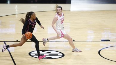 Vanderbilt guard Mikayla Blakes drives around Oklahoma guard Payton Verhulst during a 2025/26 NCAA basketball game.