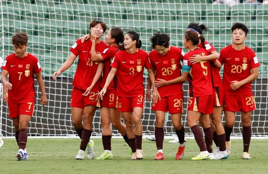 Team of China celebrate a goal during their Women's Asian Cup quarterfinal against Chinese Taipei at Perth Rectangular Stadium in Perth, Australia, March 14, 2026.