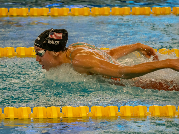 Gretchen Walsh competing in butterfly at short-course world championship level