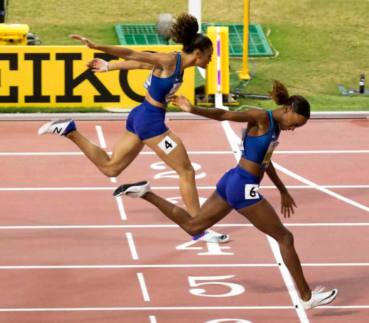 Dalilah Muhammad and Sydney McLaughlin at the finish of the 2019 world 400m hurdles final