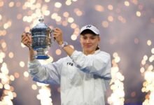 Elena Rybakina holding the 2026 US Open women’s singles trophy