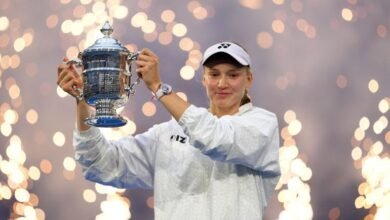 Elena Rybakina holding the 2026 US Open women’s singles trophy