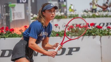 Iva Jovic preparing to receive on court in Rome, May 7, 2026