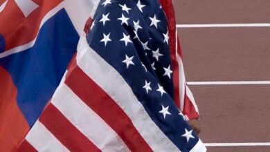Jasmine Jones wrapped in the US flag at the 2025 World Athletics Championships