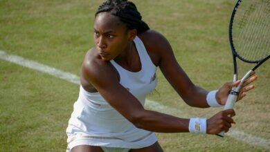 Coco Gauff preparing a backhand during Wimbledon qualifying in Roehampton in 2019.