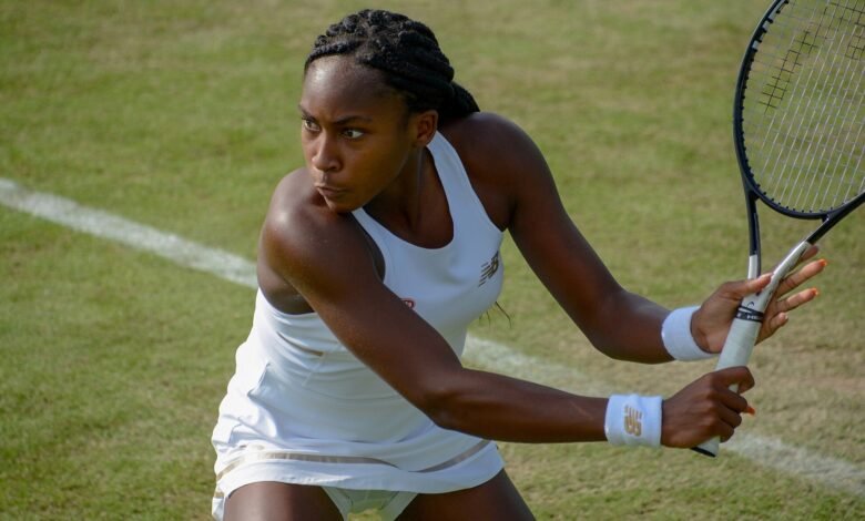 Coco Gauff preparing a backhand during Wimbledon qualifying in Roehampton in 2019.